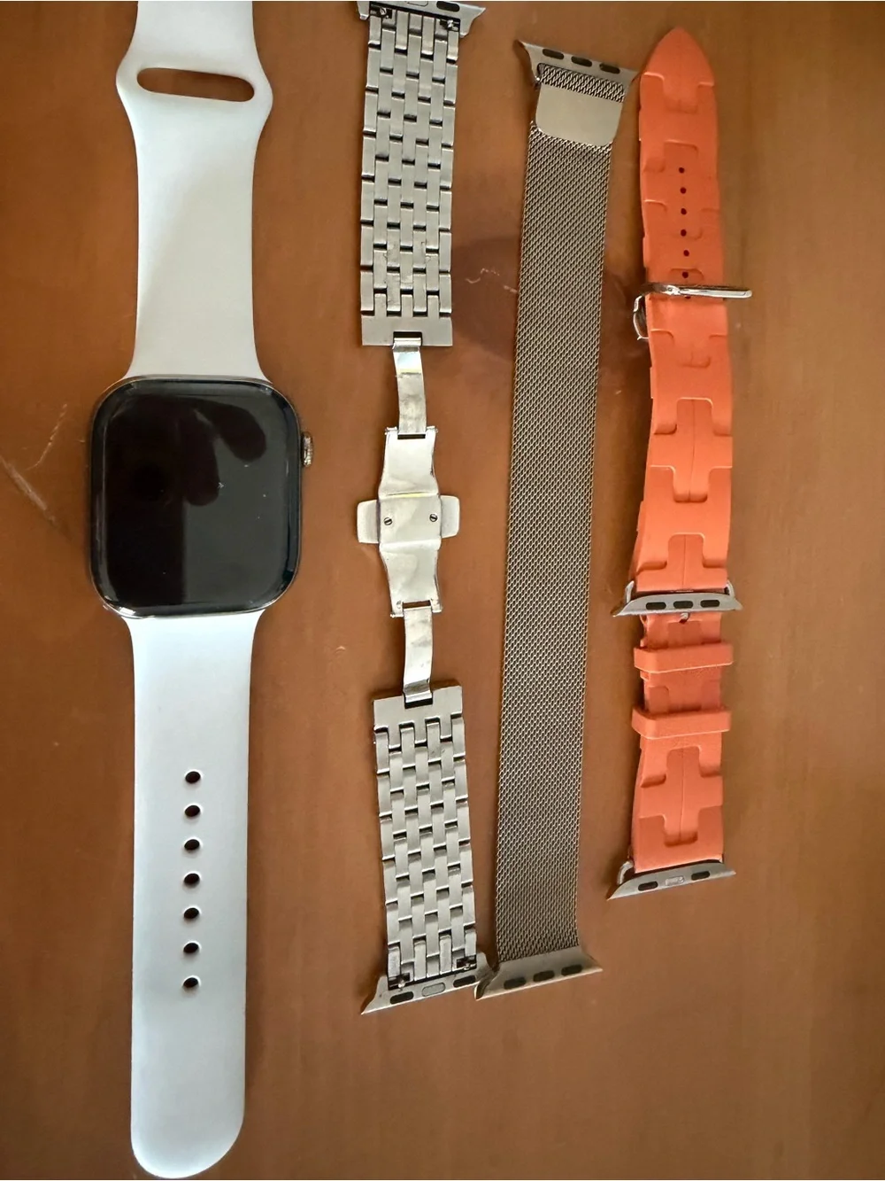 Apple Watch 10 Titanium 46 with three designer straps